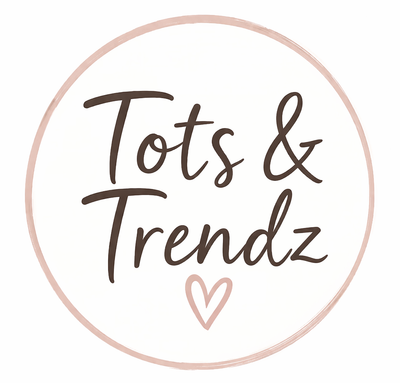 Logo of Tots & Trendz with a heart symbol on a white background