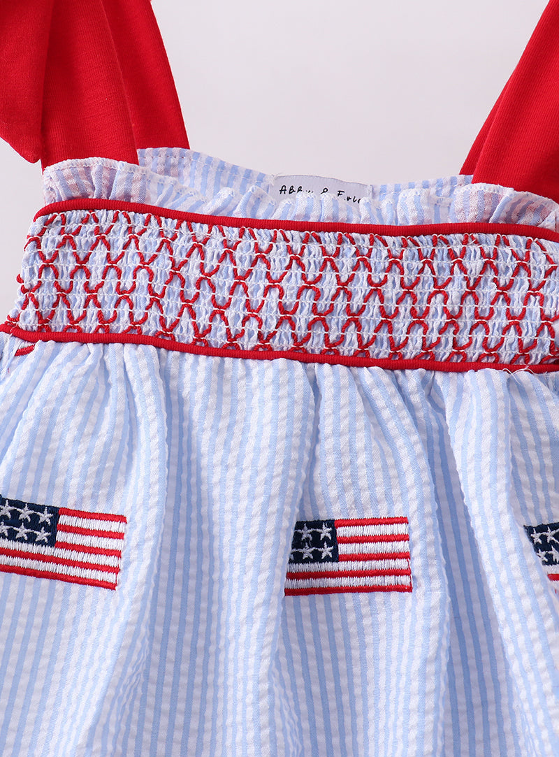 Close-up of a red, white, and blue garment with American flag patterns.