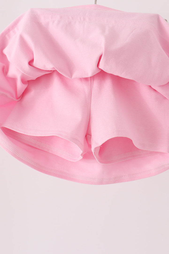 Pink skort set back view with gathered waistband and layered ruffled hem
