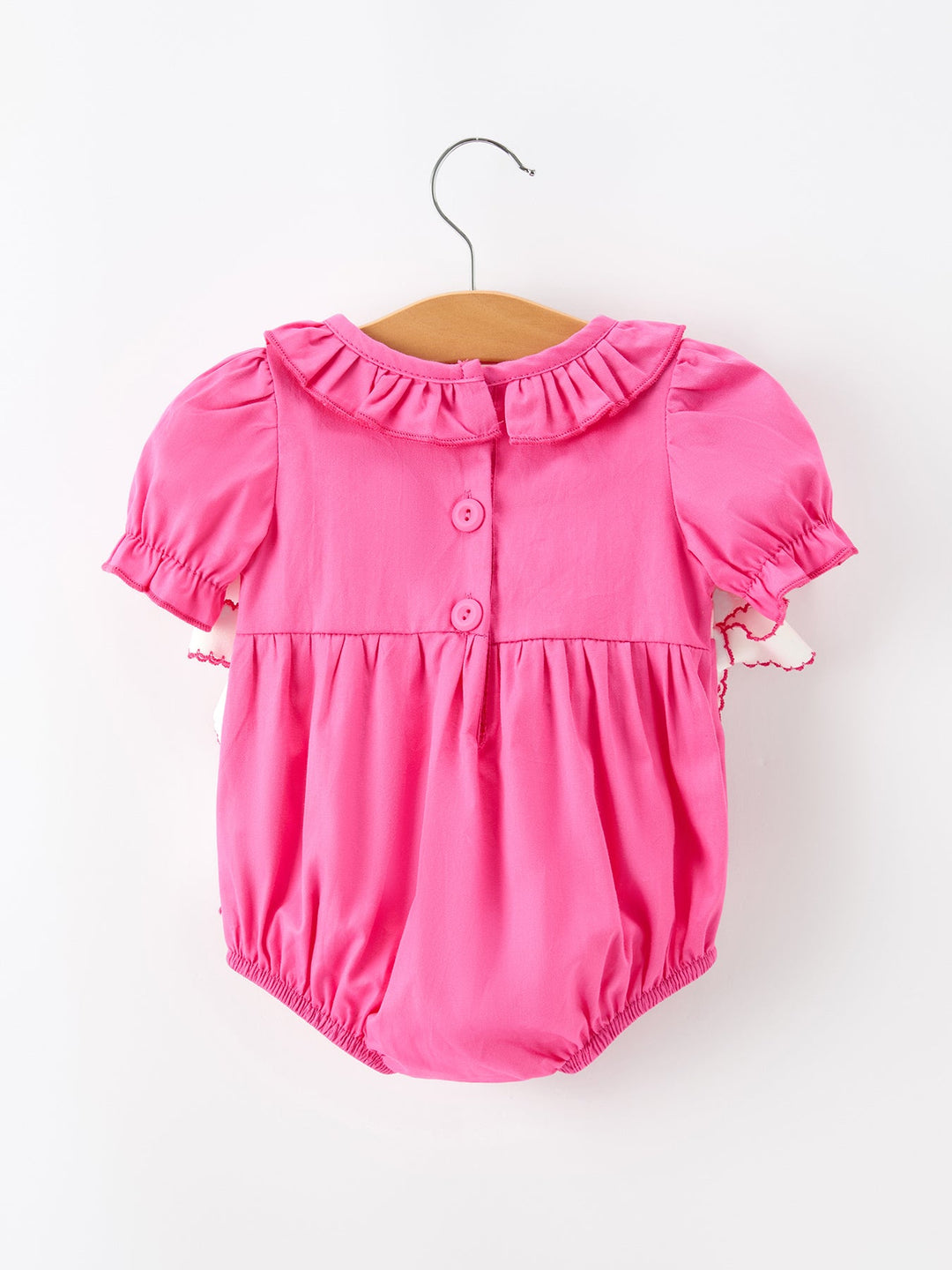 Hot pink baby girl romper with short puff sleeves and snap-button front