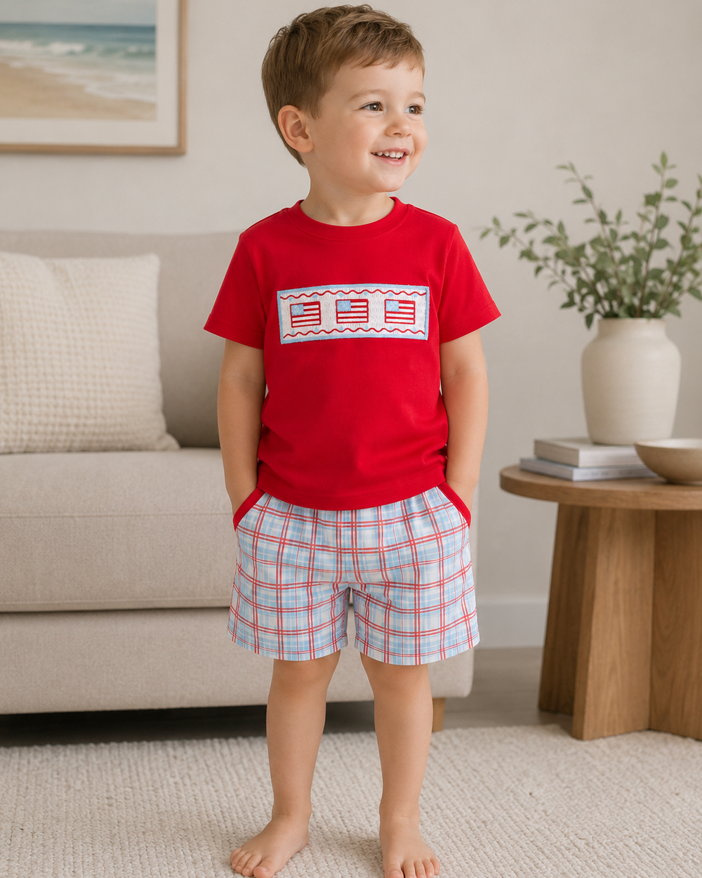 Young boy in living room wearing 4th of July Flag Plaid Shorts Set