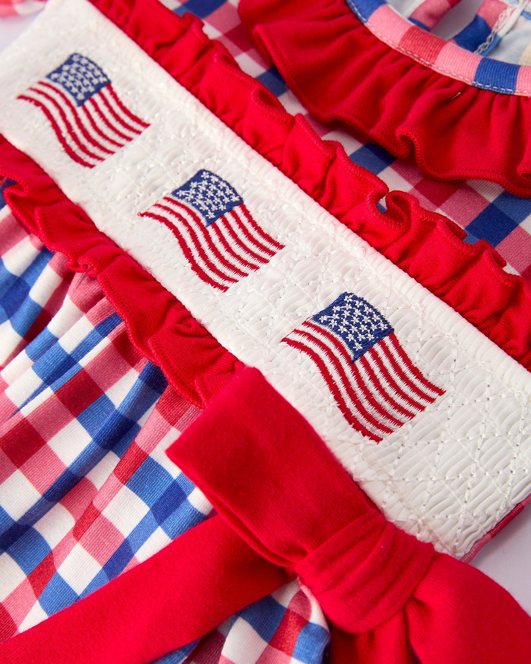 Red, white, and blue fabric with American flag patterns