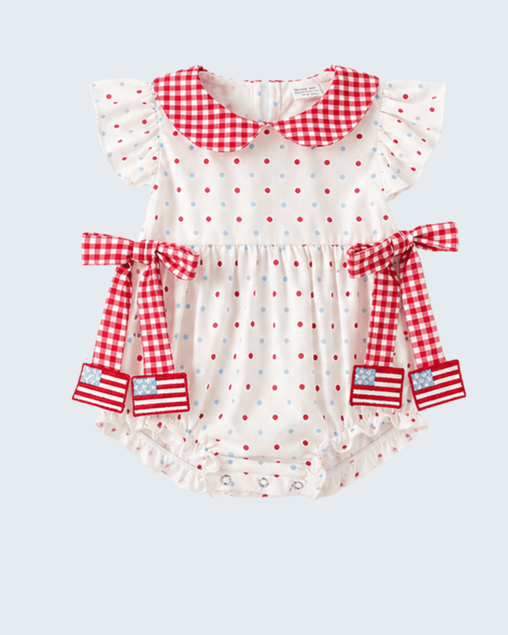Baby romper with red and white checkered collar and sleeves on a light blue background