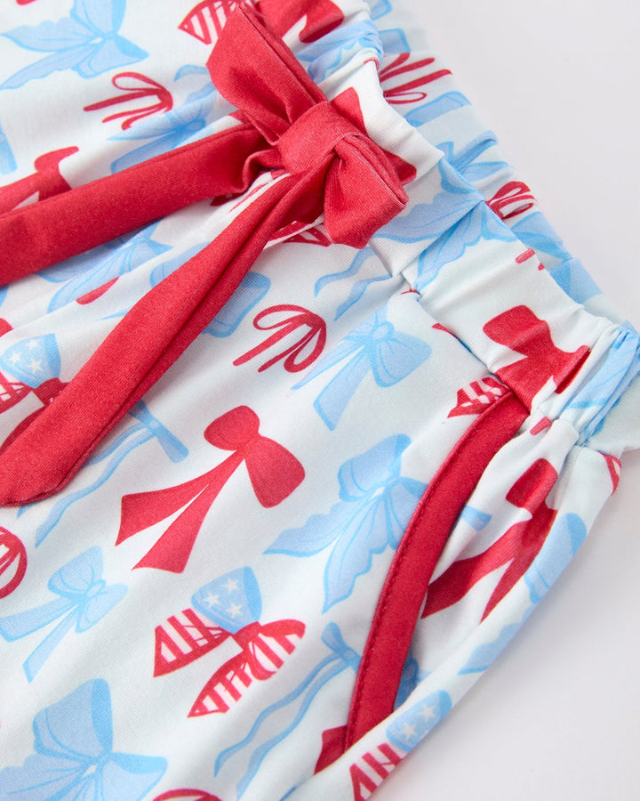 Fabric with red and blue patterns on a white background