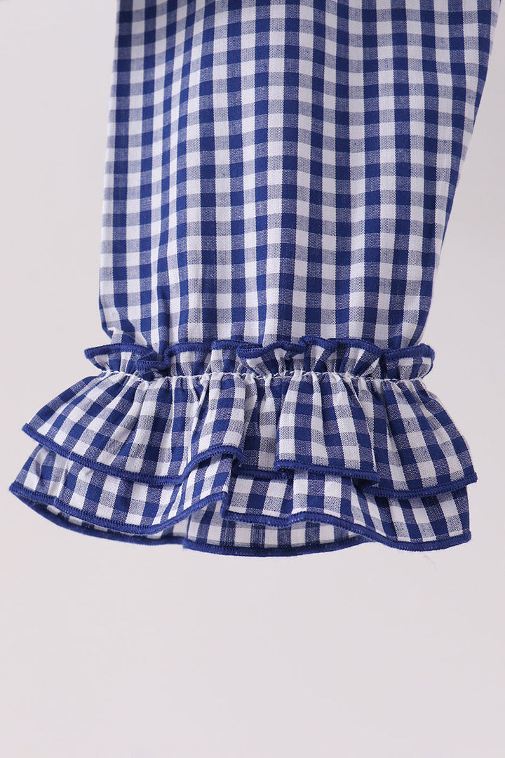 Blue gingham ruffle pants with tiered hem, close-up
