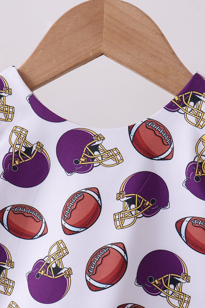 Outfit with football and helmet pattern on a hanger