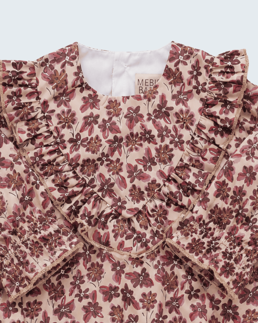 Pink floral bubble romper with puff sleeves and Mebi label