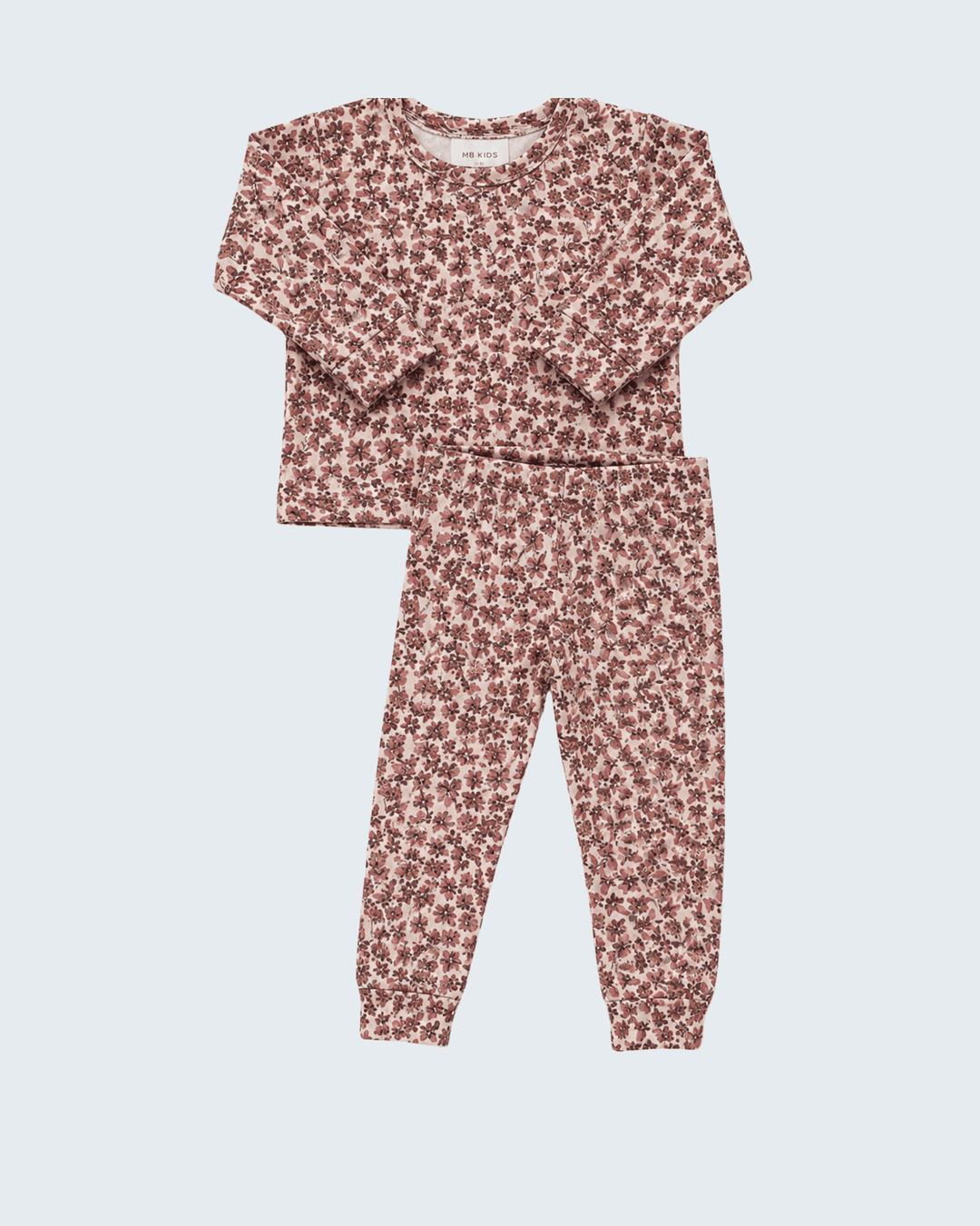 Two-piece cotton pajama set with maroon floral print, long-sleeve top and cuffed pants