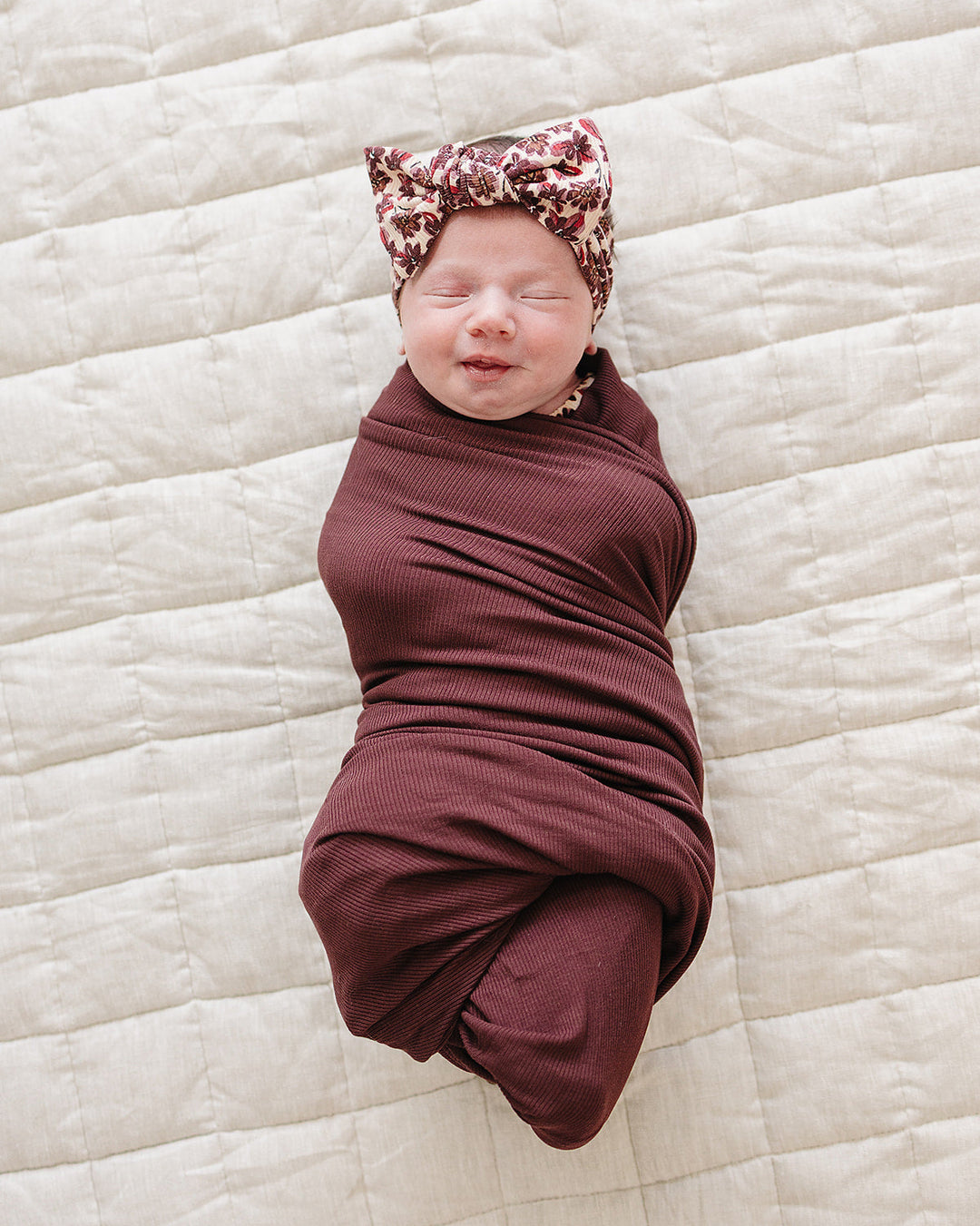 Floral baby head wrap with twisted bow knot, dark red and cream ribbed fabric