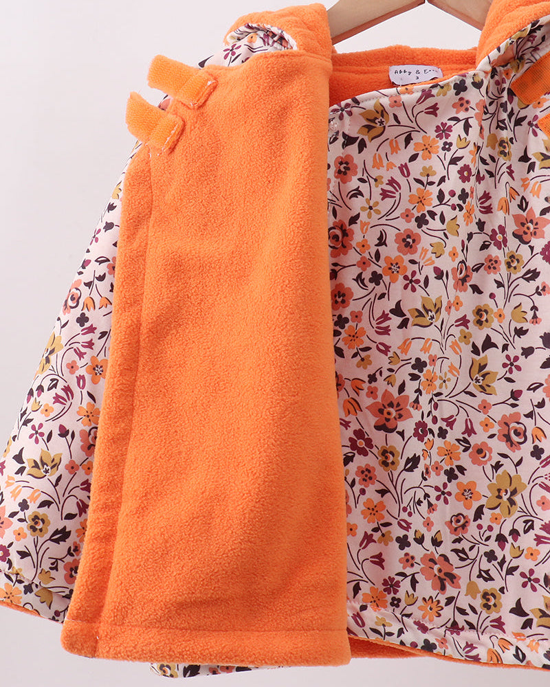Orange fleece lining on hooded coat with allover autumn floral outer layer