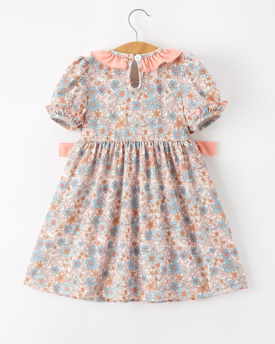 Girls floral dress with pink ruffle neck and smocked bodice, bow ties, short puff sleeves