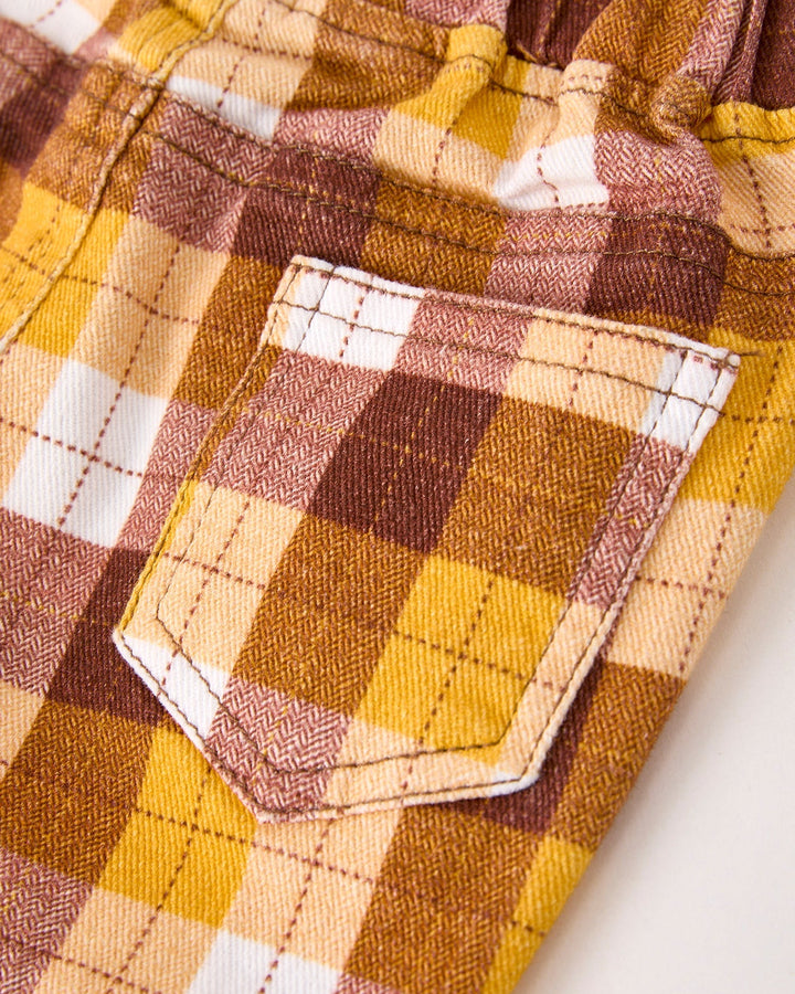 Plaid trousers with front patch pocket and topstitched plaid lining
