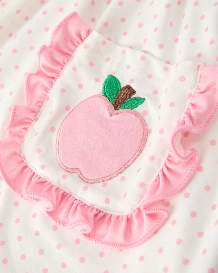 Pink peach applique on a white fabric with pink polka dots