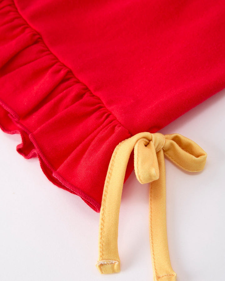 Red fabric with a yellow drawstring on a white background