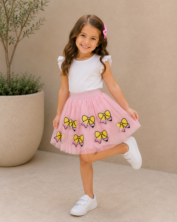 Young girl outside wearing Back To School Pencil Applique Tulle Skirt