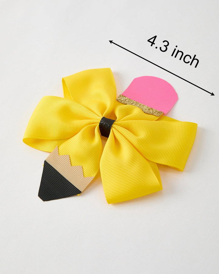 Colorful hair bow with pencil design and measurement label on a white background