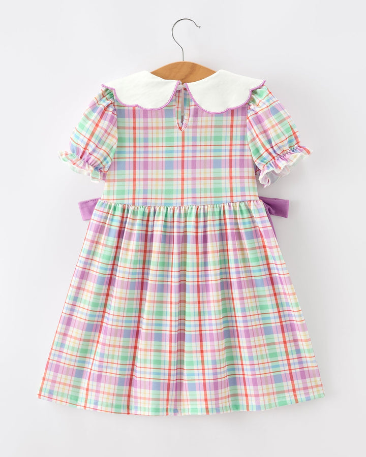 Girls plaid dress back with ruffled sleeves and tie bow accents at waist