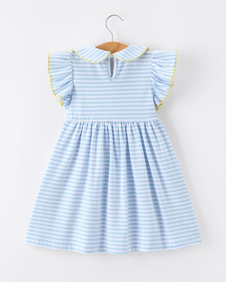 Light blue striped dress with yellow trim on a hanger against a white background