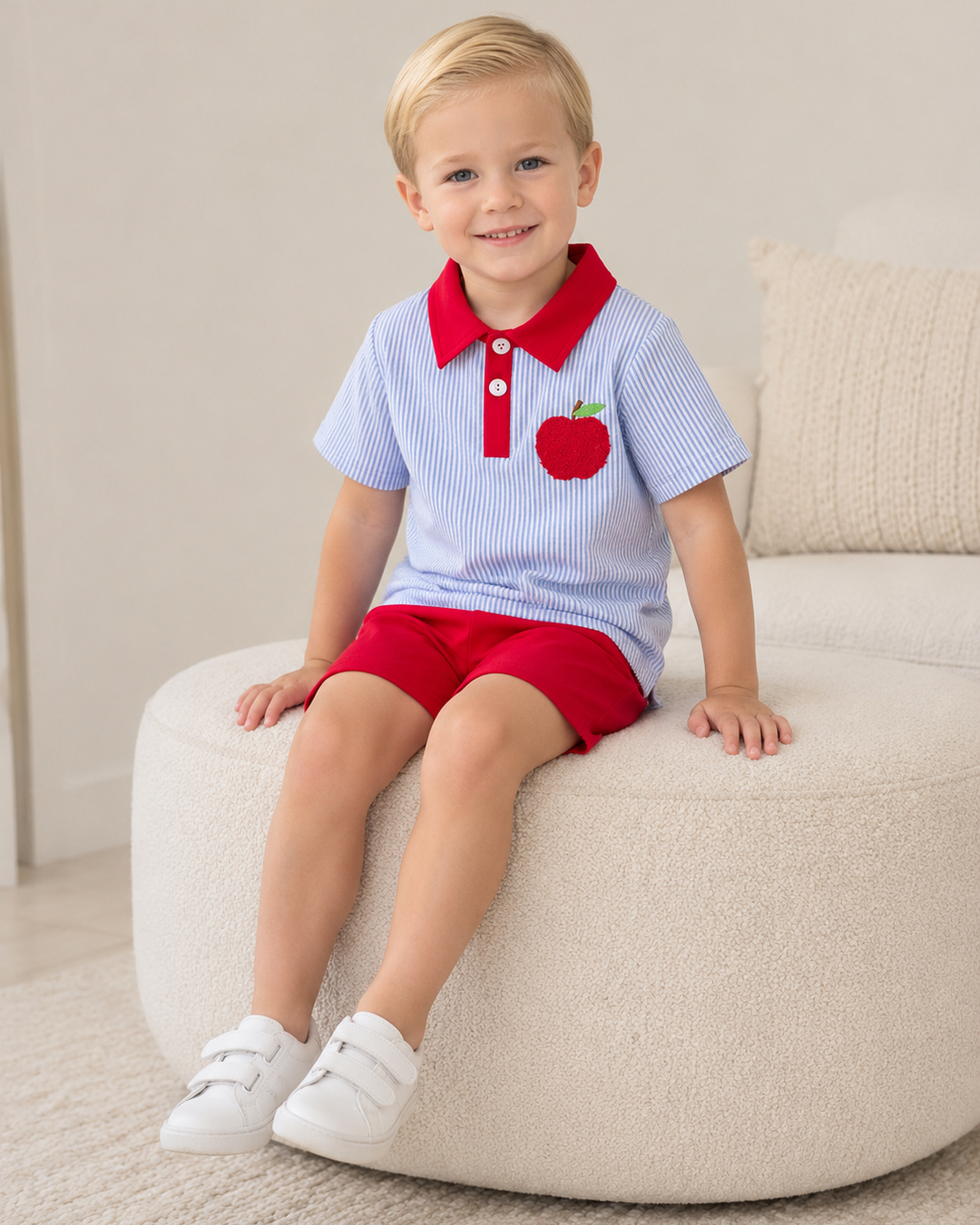 Young boy sitting on ottoman wearing Back To School Short Set
