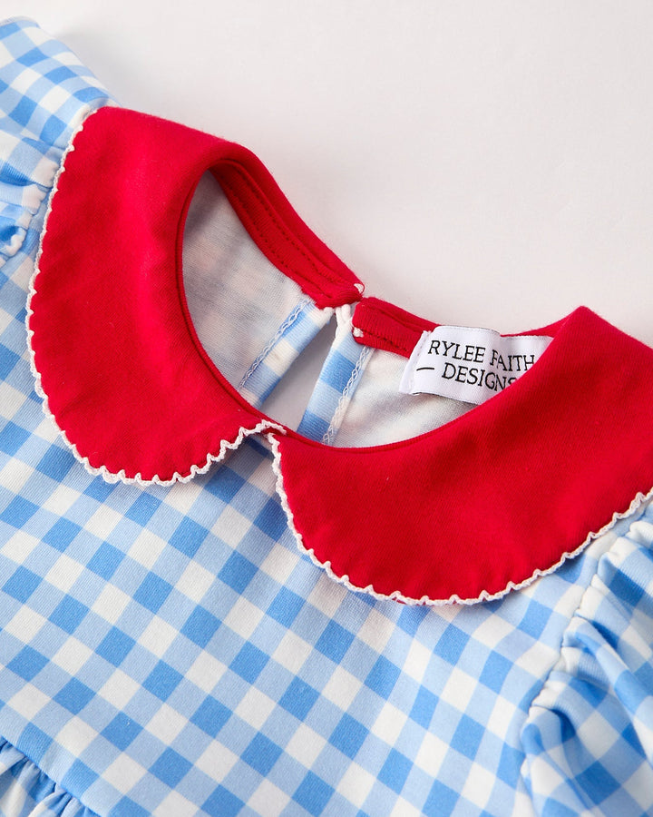 Blue and white checkered dress with a red collar and Rylee and Cru label.