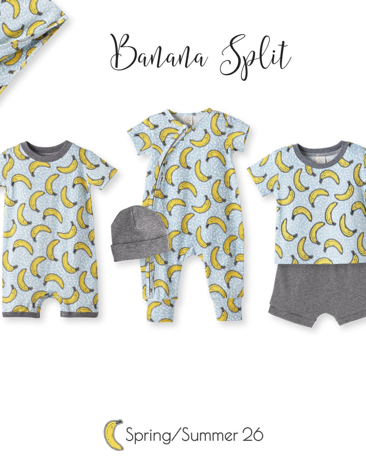 Baby clothing set with banana pattern on a white background