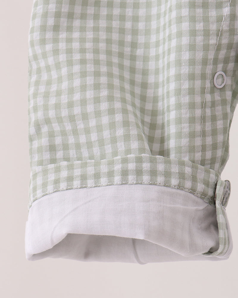 Gingham jonjon leg hem with white trim and buttoned opening