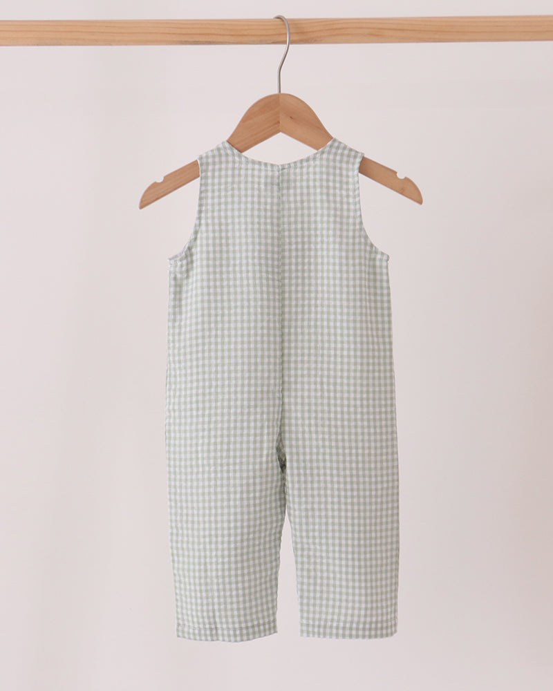 Front view gingham jonjon with turkey applique and suspender-style straps