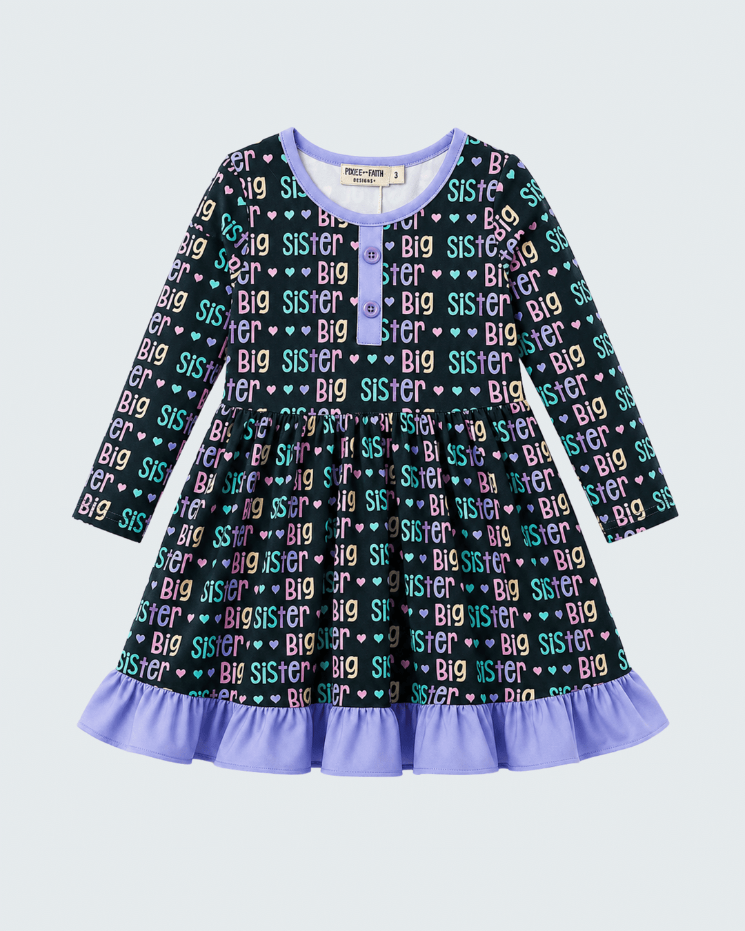 Children's dress with 'Big Sister' print on a light blue background