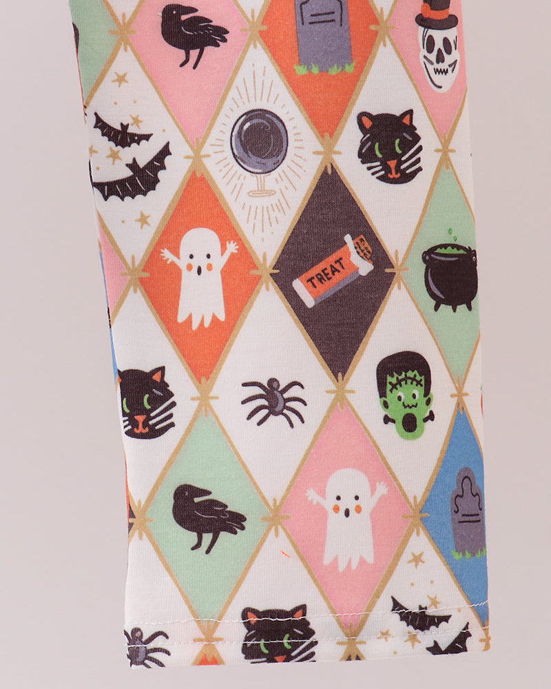 Spooky print pajama pants with diamond pattern cats, ghosts, and jack-o’-lanterns