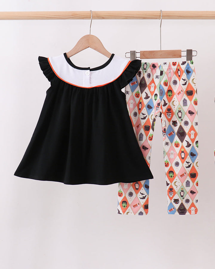 Two-piece set: black dress with orange-trim collar and spooky pajama pants
