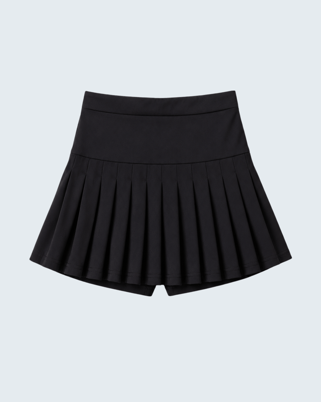 Black pleated skirt on a light gray background
