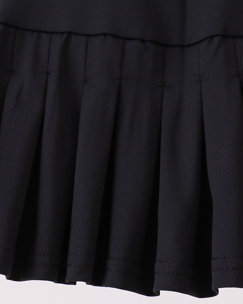 Close-up of a black skirt on a light gray background