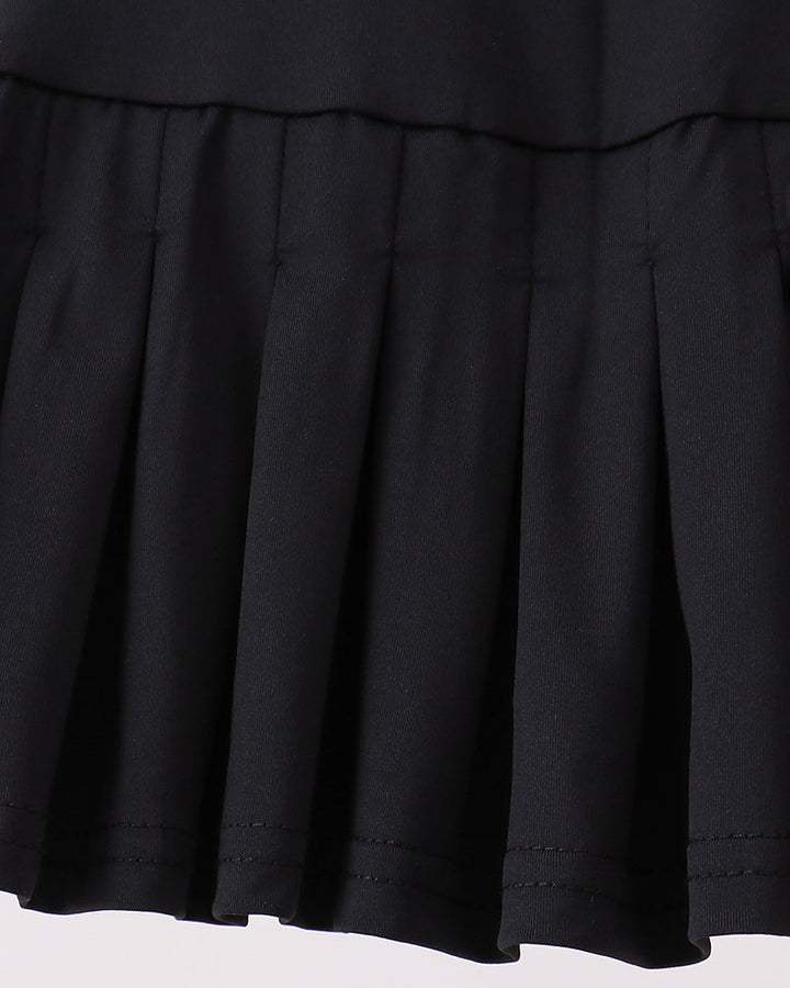 Close-up of a black skirt on a light gray background