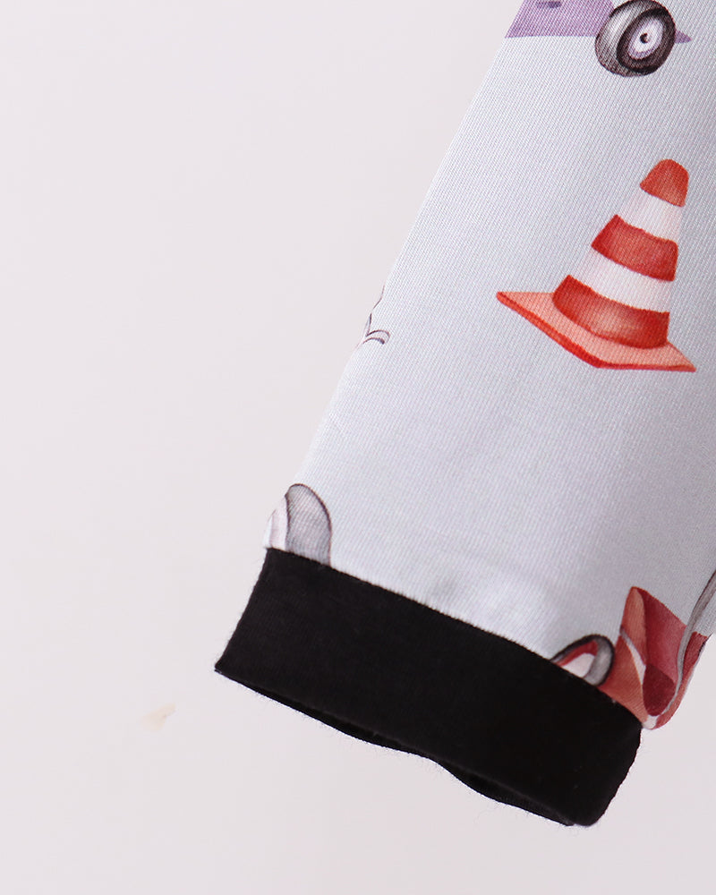 Bamboo pajama sleeve with black cuff hem and colorful racing cars on light fabric