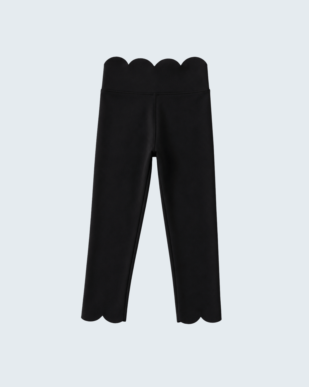 Black pants with scalloped hem on a light gray background
