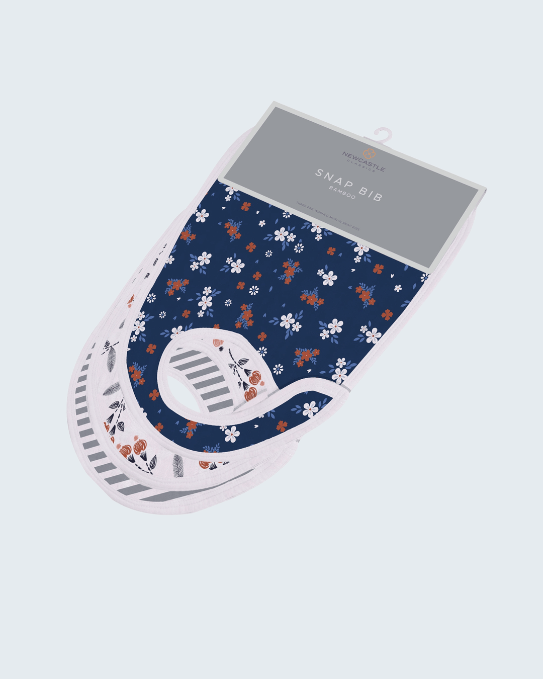 Floral-patterned product with packaging on a light gray background