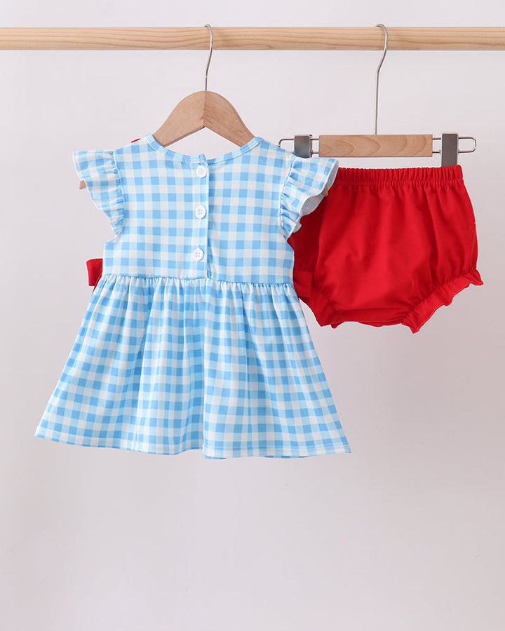 Blue gingham dress with red bloomer shorts and button-front skirt