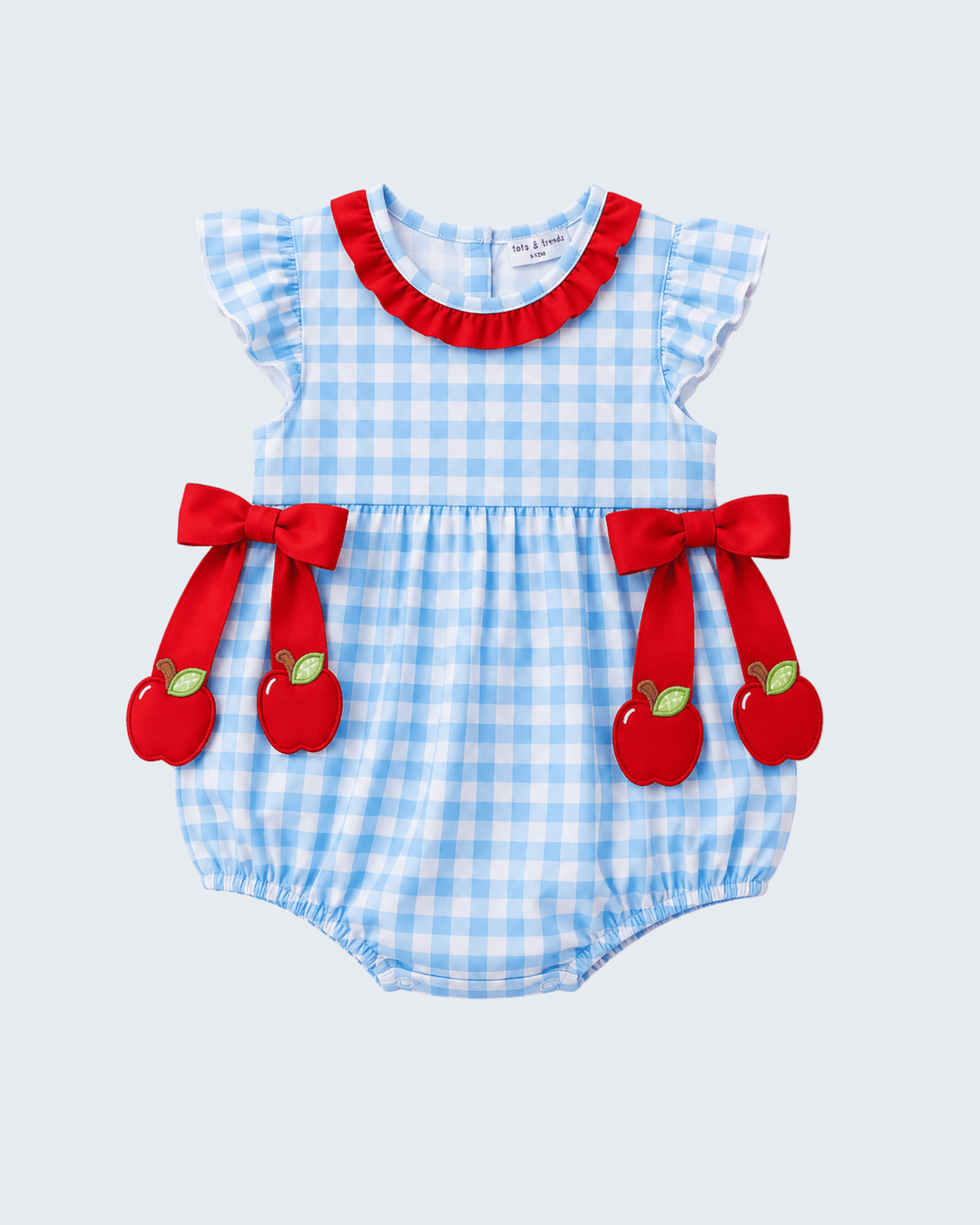Blue gingham baby bubble with red ruffled neckline, bows, and apple appliqués