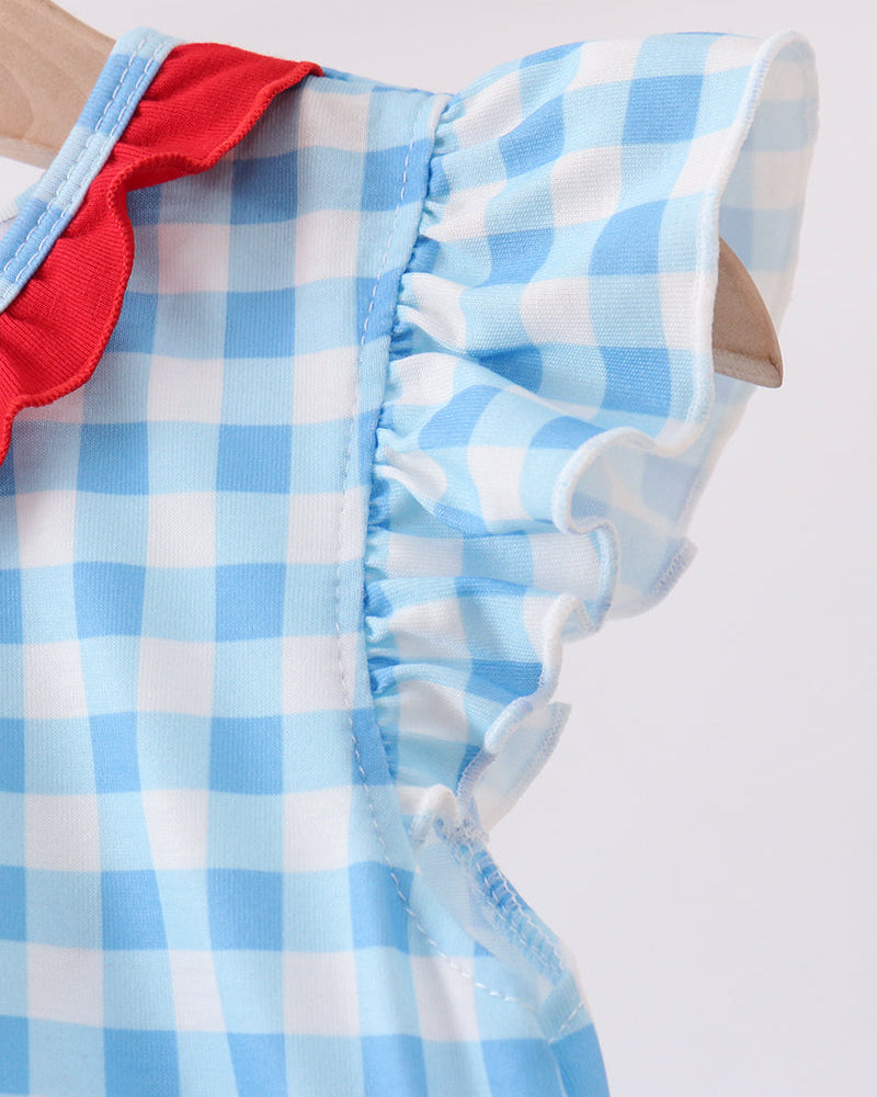 Gingham bubble romper with red collar trim and ruffled button placket