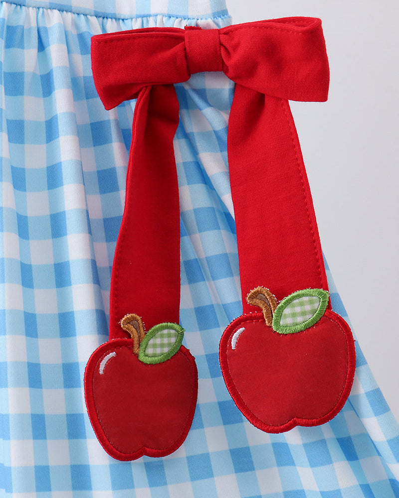 Blue gingham ruffle dress with red apple appliqué bow