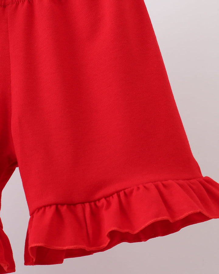 Red ruffle-trim shorts with elastic waistband