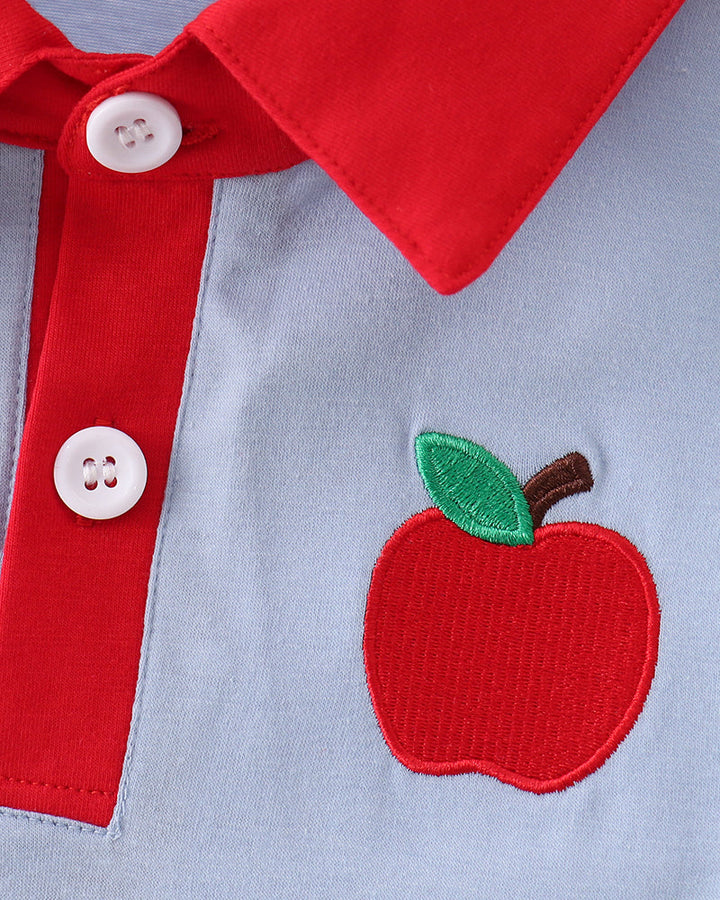 Blue shirt with red collar, button placket, and apple appliqué