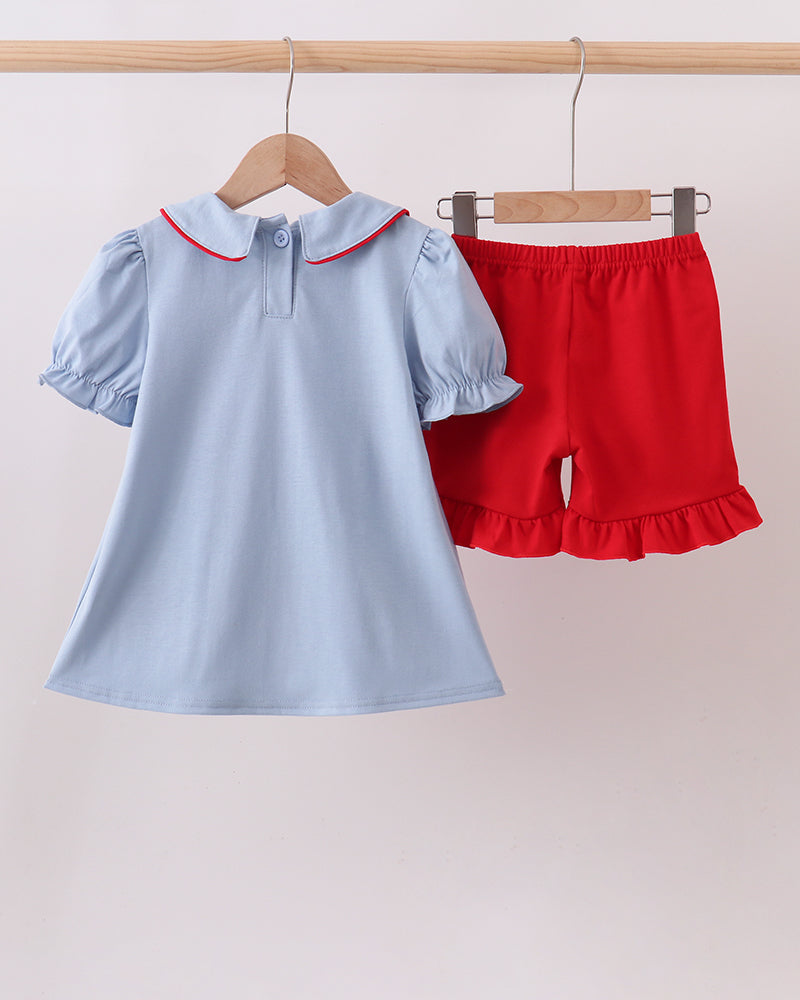 Light blue dress with red collar and red ruffle shorts set