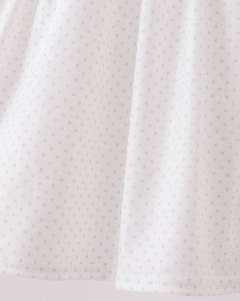 White ruffle dress skirt with subtle dotted fabric texture