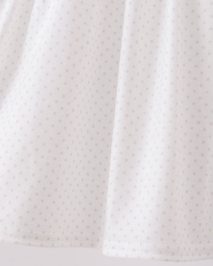 White ruffle dress skirt with subtle dotted fabric texture