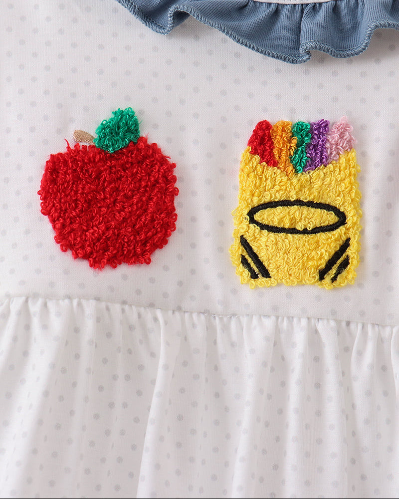 White dress with colorful crayon-style and heart applique on the front