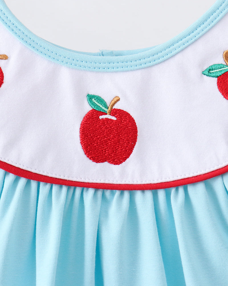 Embroidered apples on a blue dress