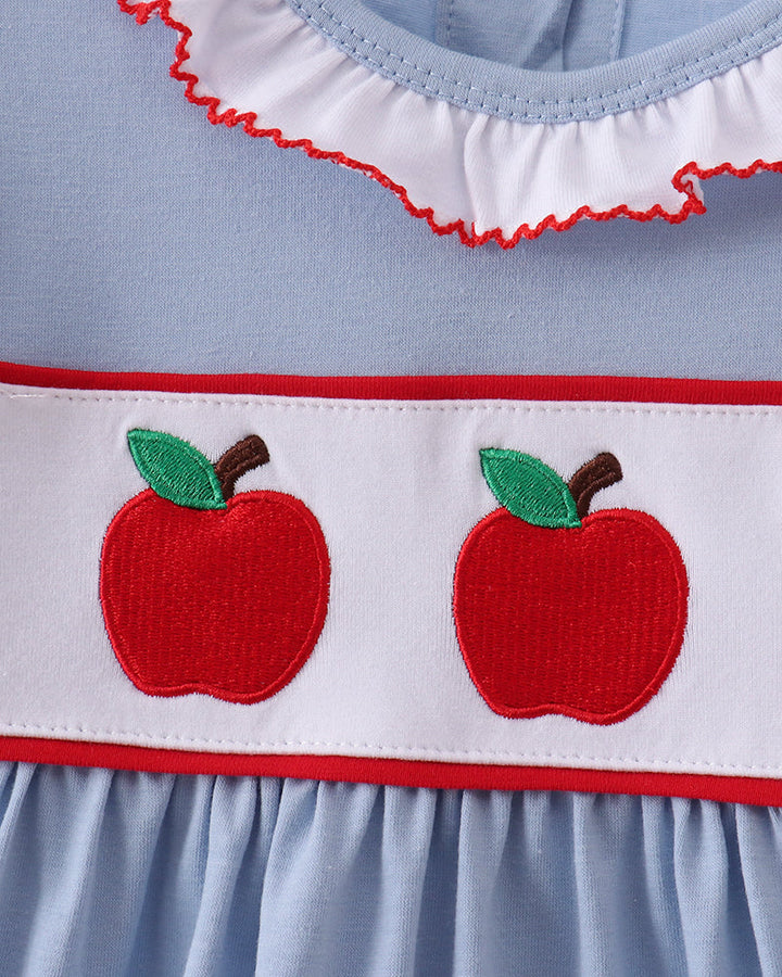 Light blue dress bodice with red apple embroidery on white band and red stitched edge