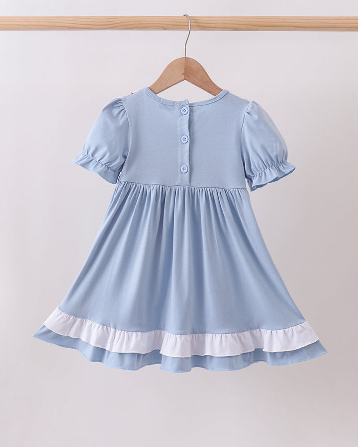 Light blue baby dress with button placket back and layered ruffle skirt hem