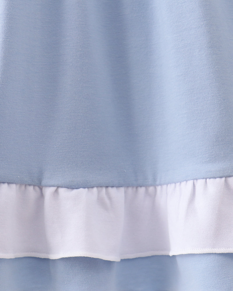 Light blue dress skirt with gathered waist and layered white ruffle hem